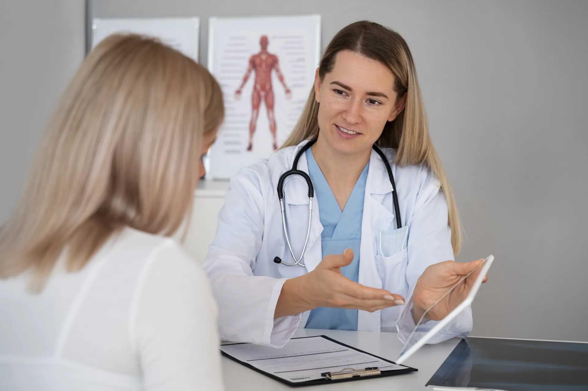 Doctor speaking with patient